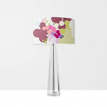Load image into Gallery viewer, Geometric abstract drum lampshade in soft hues on a clear table lamp, perfect for modern home decor.